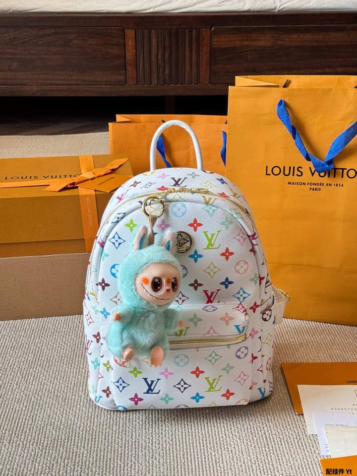 Louis Vuitton Monogram Mini Backpack in Monogram With Light Blue Charm