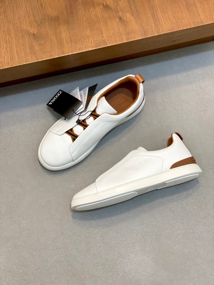 Ermenegildo Zegna Triple Stitch Sneakers in Black Leather With Brown Tag