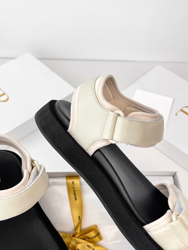 The Row Classic Velcro Beach Sandals in Black And Cream