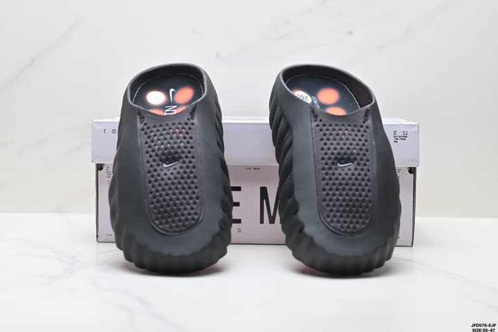 Nike Mind 001 Recovery Slide in Black With Orange Nodes