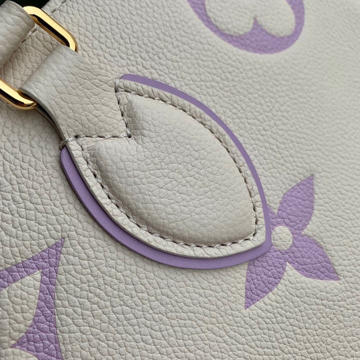 Louis Vuitton ONTHEGO Medium Tote Bag in Cream/white Monogram With Lilac Print