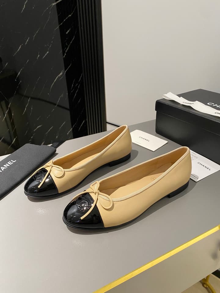 Chanel Classic Ballet Flats in Tan With Black Cap Toe