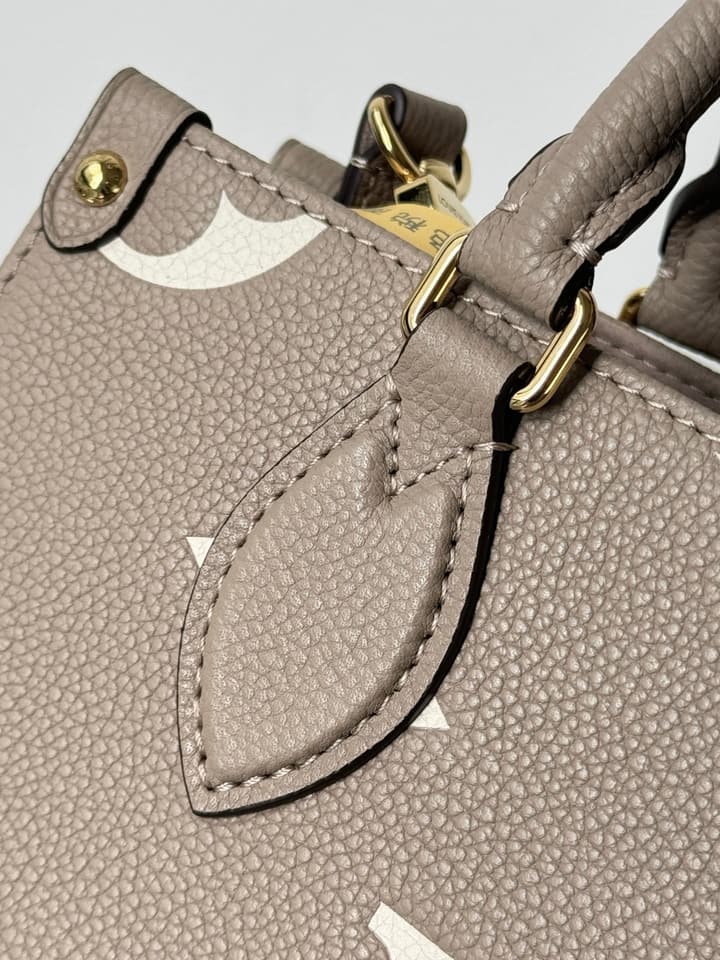 Louis Vuitton OnTheGo Small Handbag in Elephant Grey Monogram