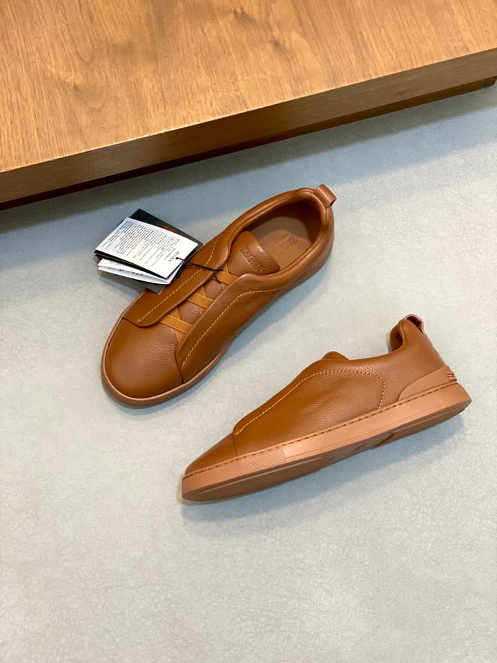 Ermenegildo Zegna Triple Stitch Sneakers in Black Leather With Brown Tag