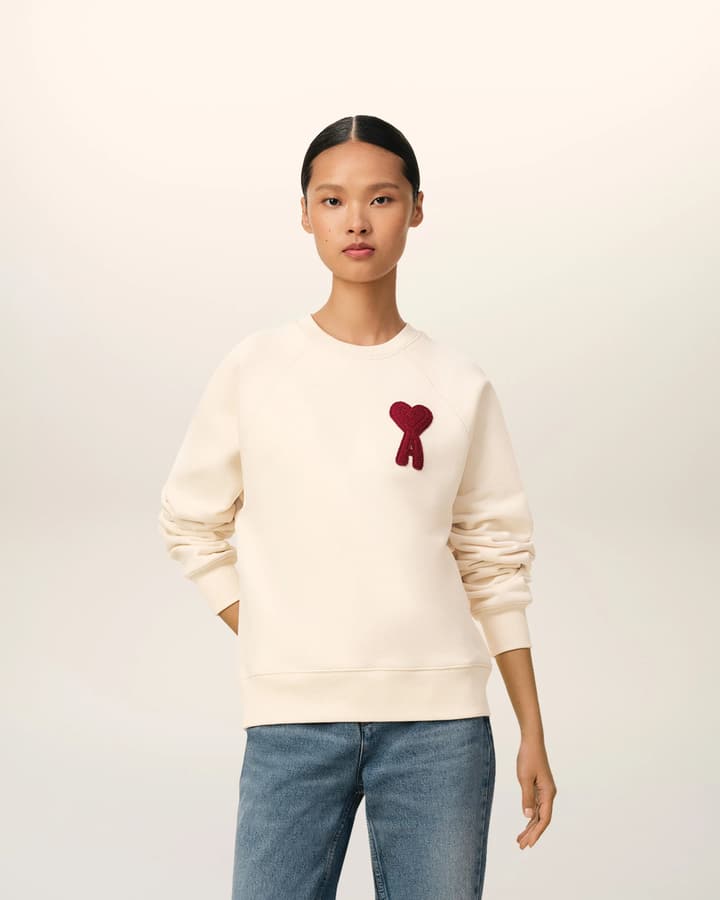 AMI Paris Ami de Coeur Raglan Crewneck Sweatshirt – 25FW in Apricot With Clear Heart
