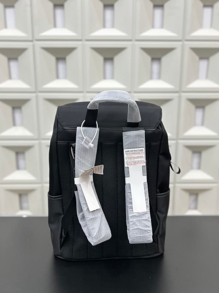 RIMOWA Never Still Canvas Flap Backpack in Black Canvas