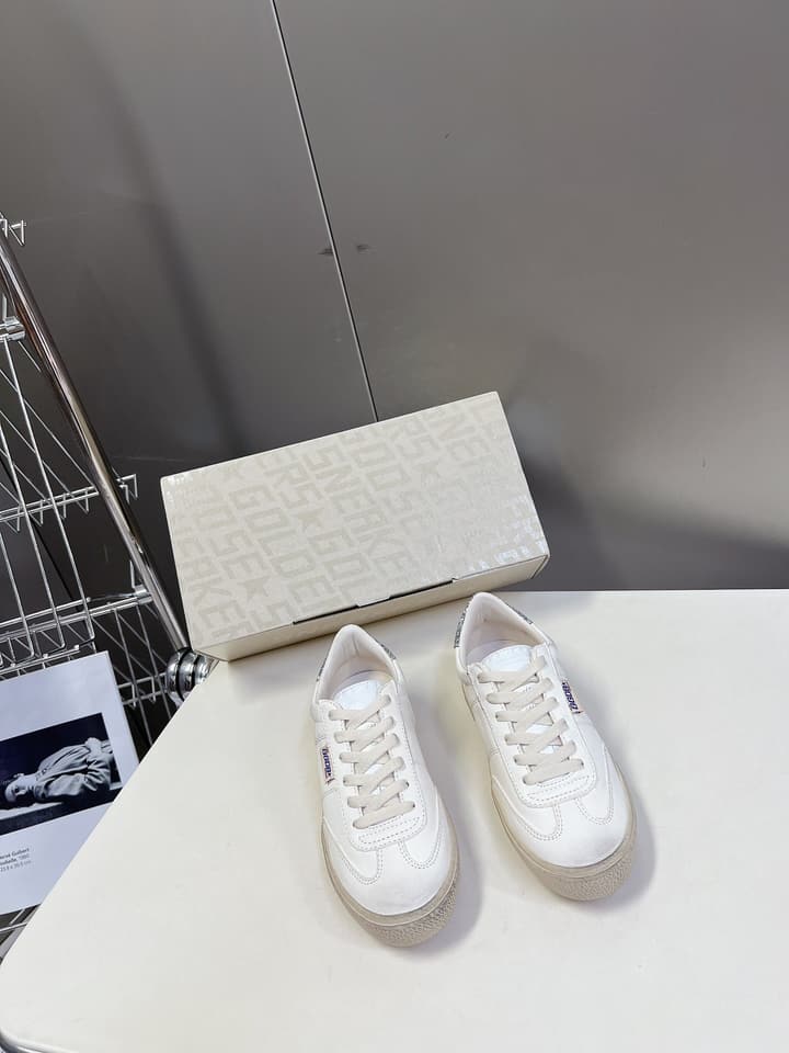 Golden Goose Distressed Leather Sneakers in Iridescent Pink