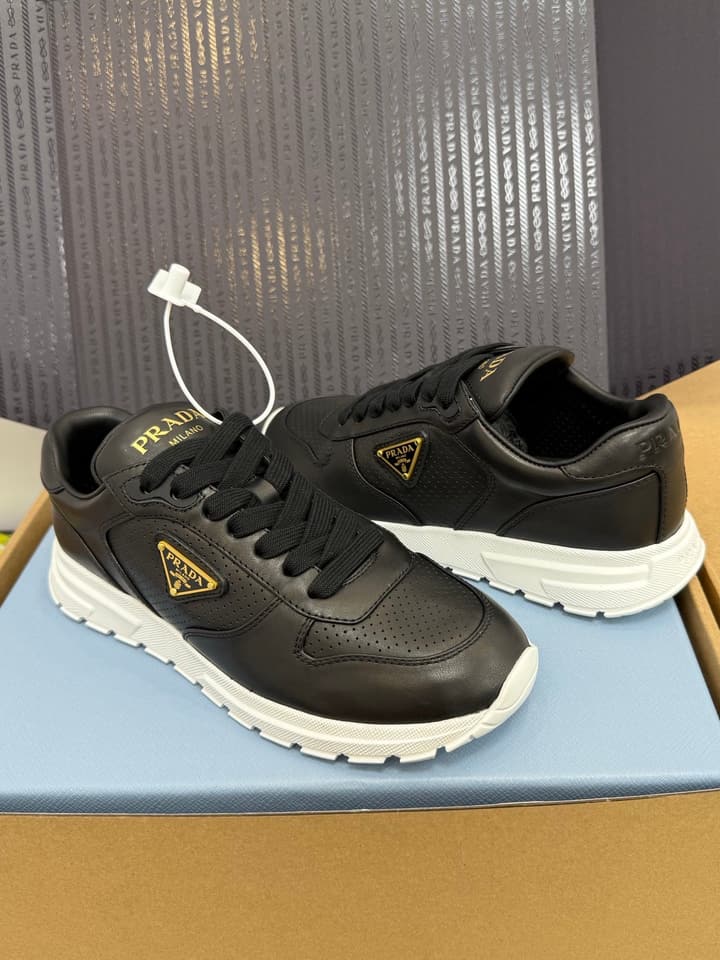 Prada Triangle Logo Sporty Sneakers – 2025 Early Autumn Collection in Black