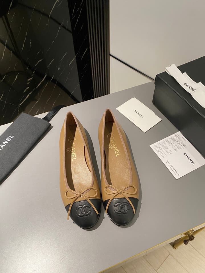Chanel Classic Ballet Flats in Tan With Black Cap Toe