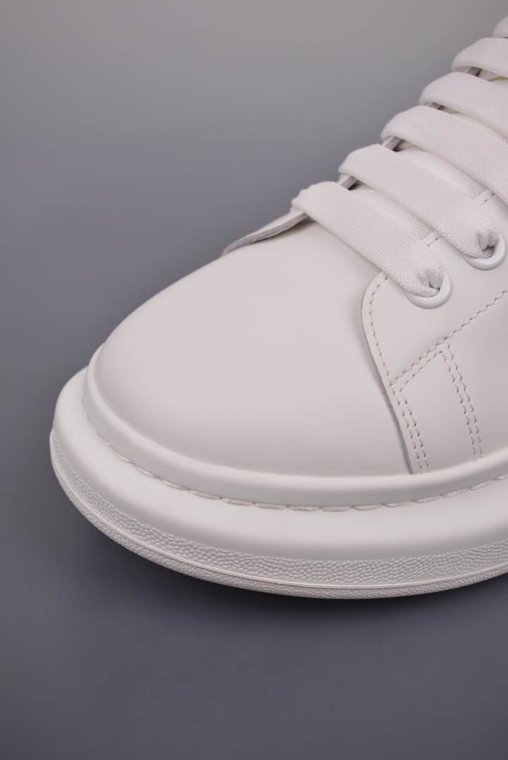 Alexander McQueen Oversized Low-Top Platform Sneakers in White With Dark Heel Tab