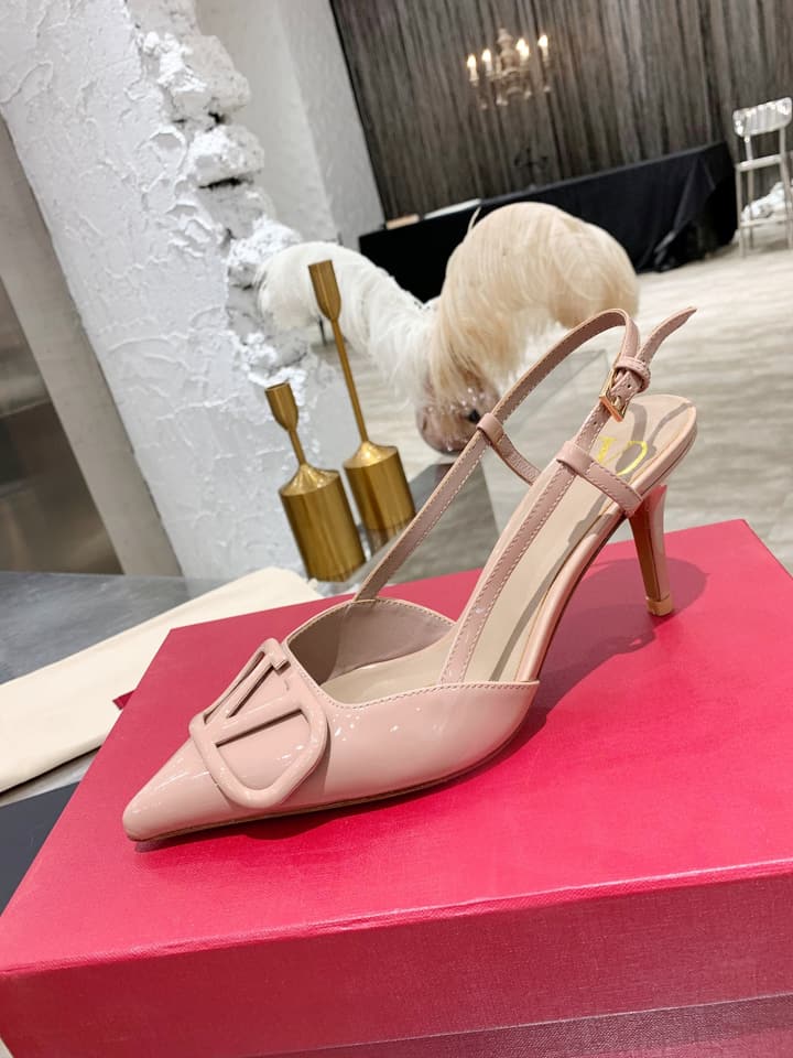 Valentino VLogo Pointed-Toe Patent Leather Pumps in Black Patent