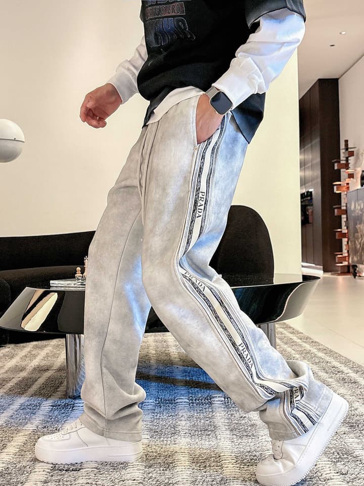 Prada Classic Logo Casual Pants – 2025FW in Black With White Side Stripe