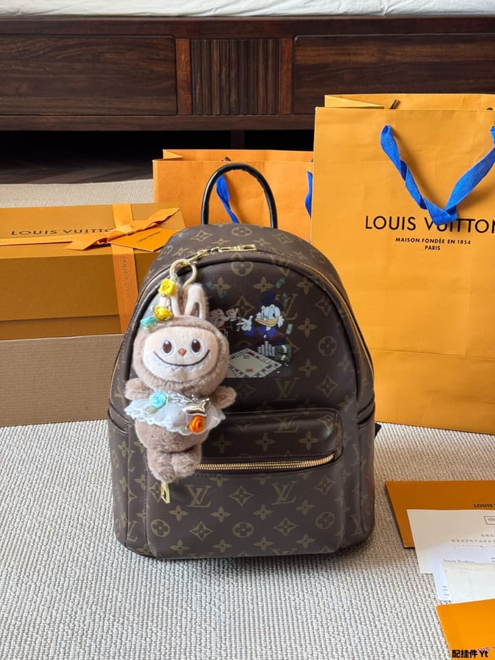 Louis Vuitton Monogram Mini Backpack in Monogram With Light Blue Charm