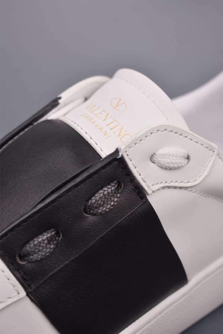 Valentino Rockstud Untitled Rivet Sneakers – 2025 Collection in White With Black Band