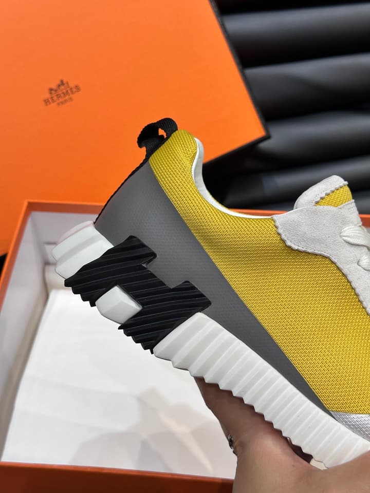 Hermès Bouncing Calfskin Mesh Sneakers in Black With White Stripe