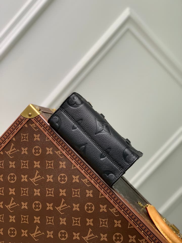 Louis Vuitton OnTheGo BB Monogram Empreinte Handbag in Beige And Cream Monogram