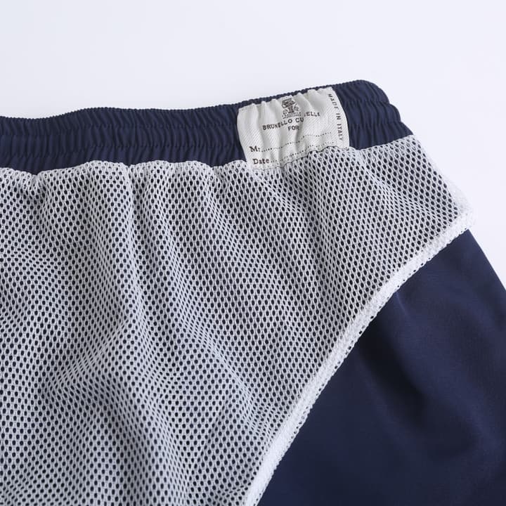 Brunello Cucinelli Embroidered Swim Trunks in Navy Blue