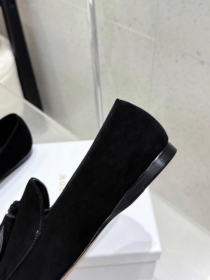 The Row Tassel Loafers in Black Suede