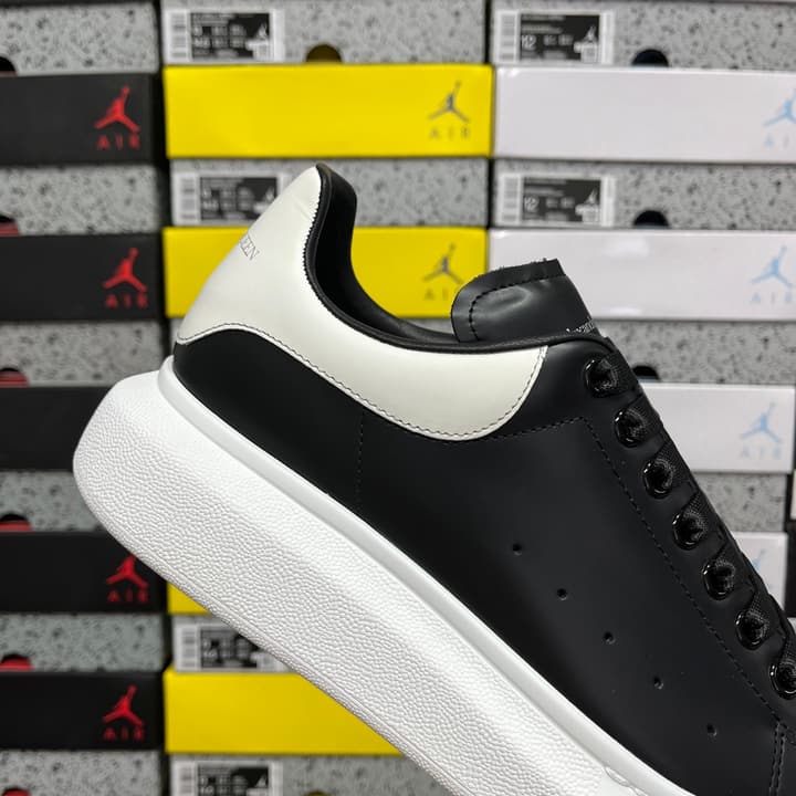 Alexander McQueen Oversized Low-Top Sneakers in All Black With White Sole