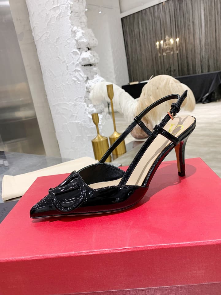 Valentino VLogo Pointed-Toe Patent Leather Pumps in Black Patent