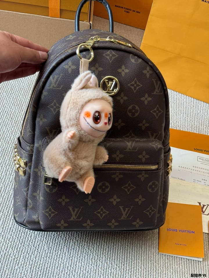 Louis Vuitton Monogram Mini Backpack in Monogram With Light Blue Charm