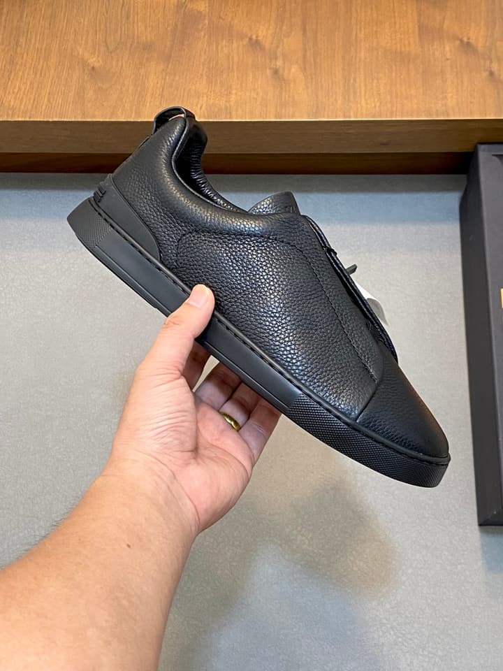 Ermenegildo Zegna Triple Stitch Sneakers in Black Leather With Brown Tag