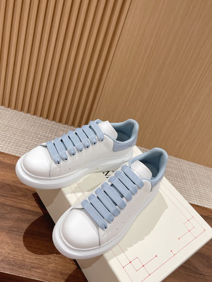 Alexander McQueen Classic Versatile White Sneakers in White With Black Laces & Heel