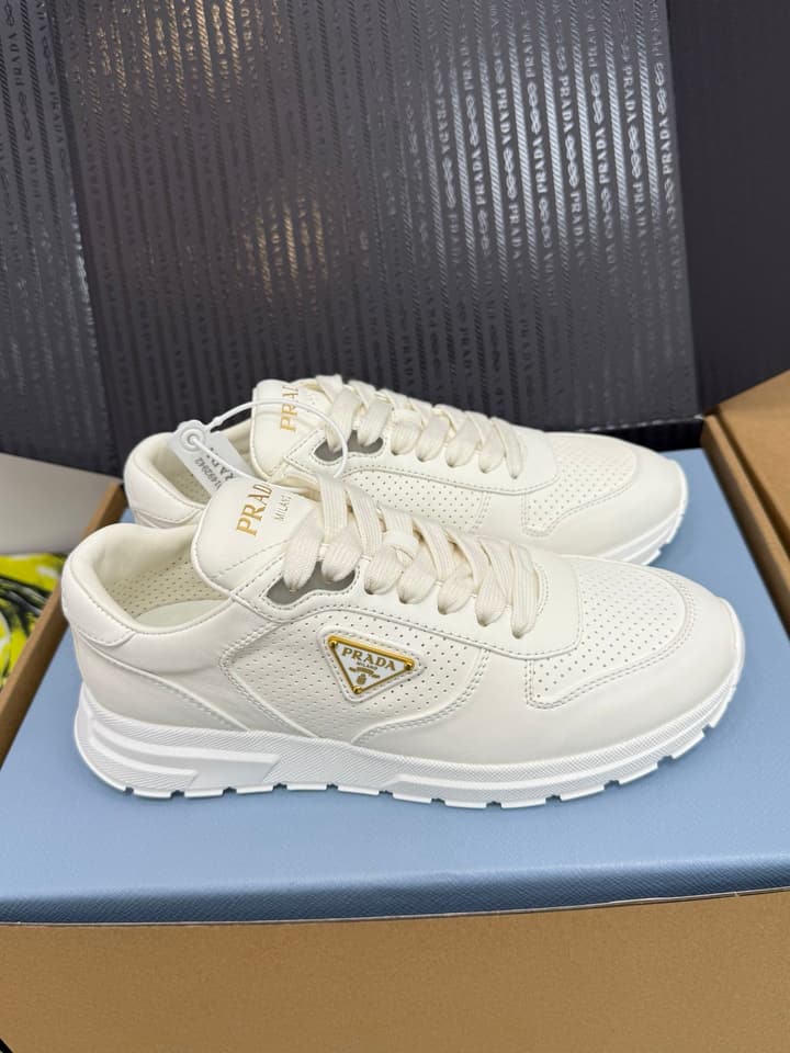 Prada Triangle Logo Sporty Sneakers – 2025 Early Autumn Collection in Black