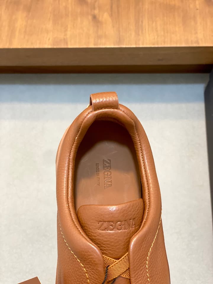 Ermenegildo Zegna Triple Stitch Sneakers in Black Leather With Brown Tag