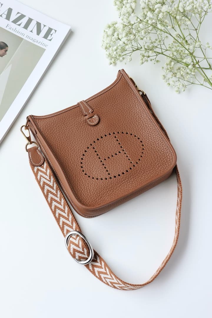 Hermès Mini Evelyne TPM – Gold Brown in Gold Brown With Patterned Strap