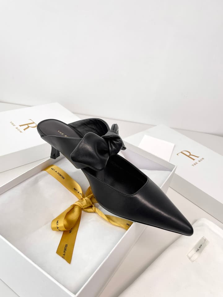 The Row Leather Bow Mules in Black Leather