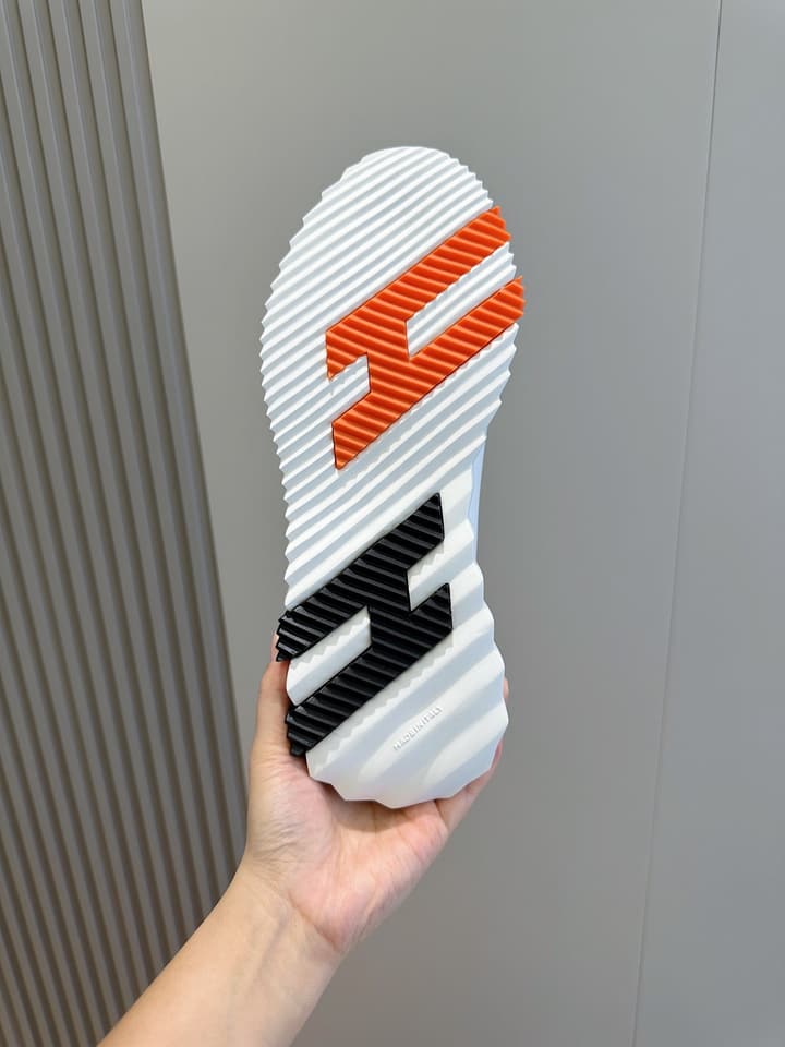 Hermès Bouncing Sneakers in Black And White Color Block
