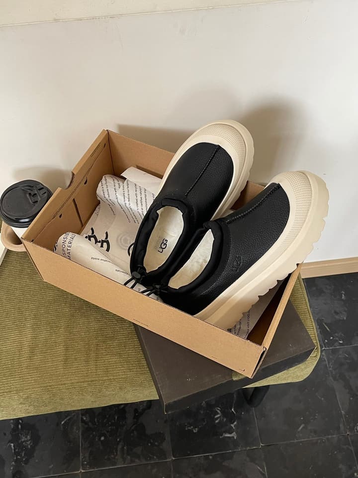 UGG Tasman Low-Top Leather Slippers in Black And Beige