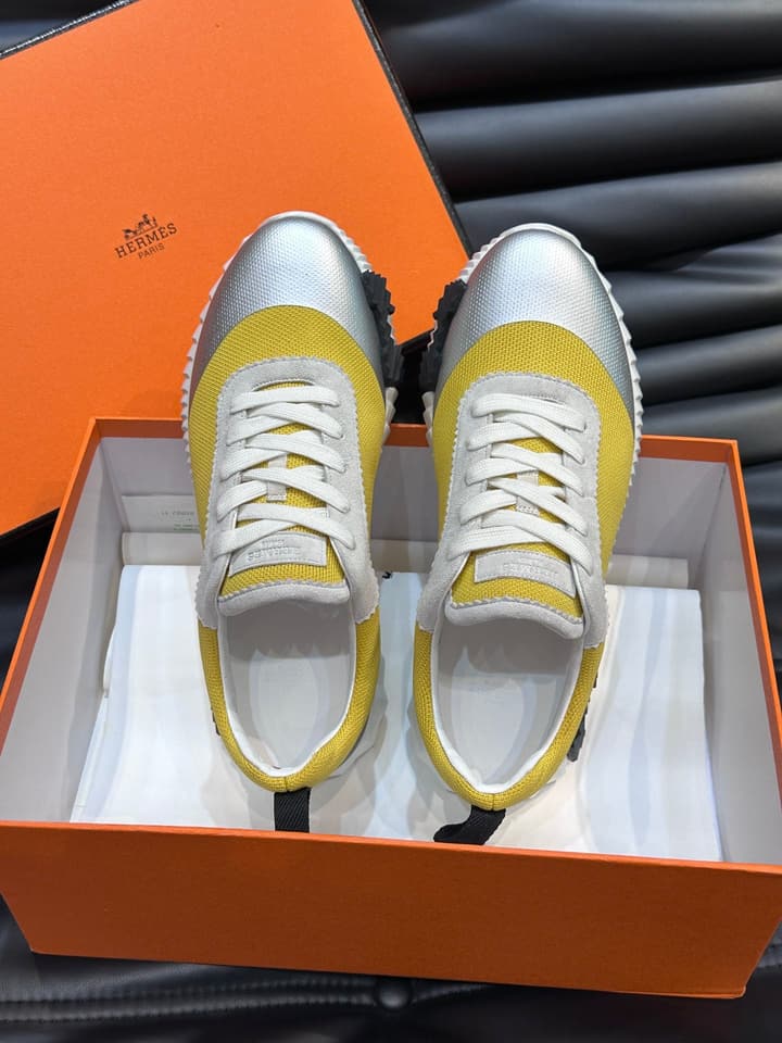 Hermès Bouncing Calfskin Mesh Sneakers in Black With White Stripe