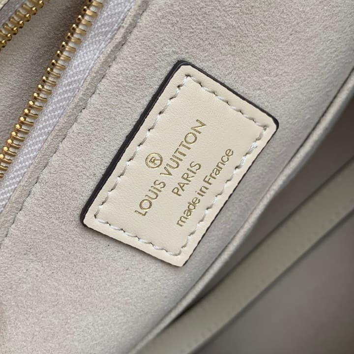 Louis Vuitton OnTheGo Small Tote Bag in Cream Empreinte With Monogram Sides