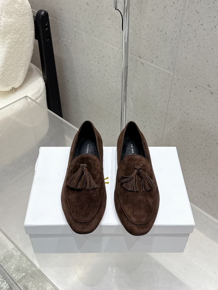 The Row Tassel Loafers in Black Suede