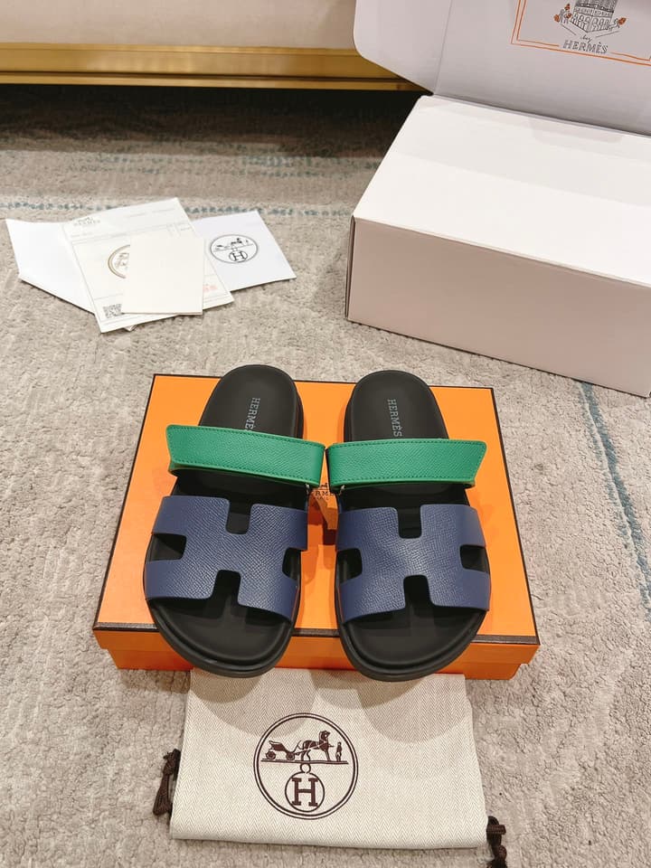 Hermès Chypre Suede Unisex Slides in Black With Dark Blue Strap