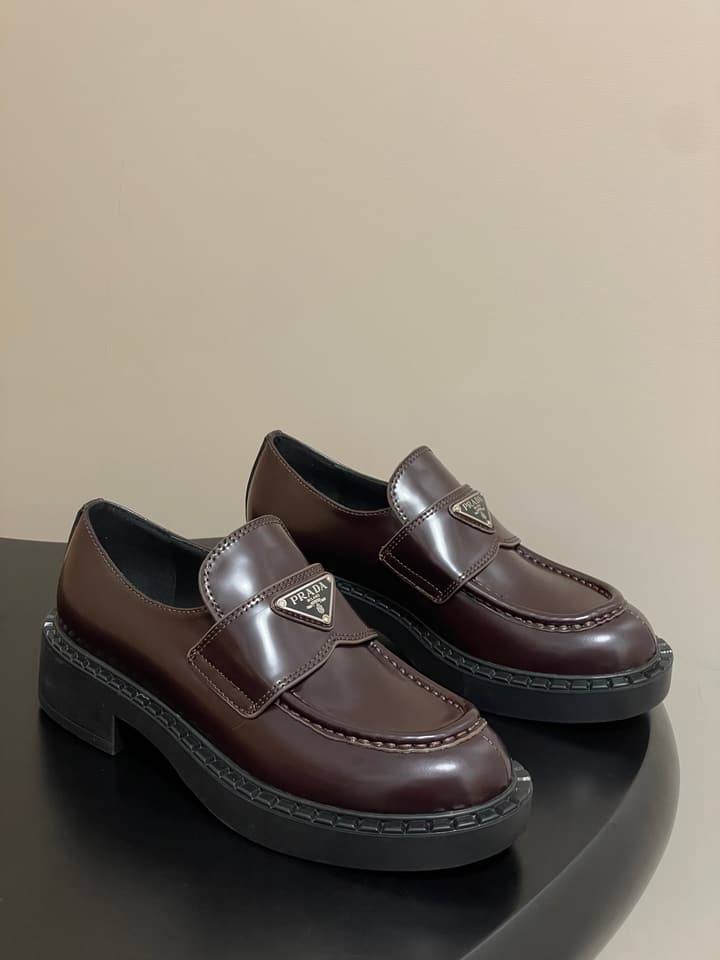Prada Triangle Logo Platform Loafers in Black
