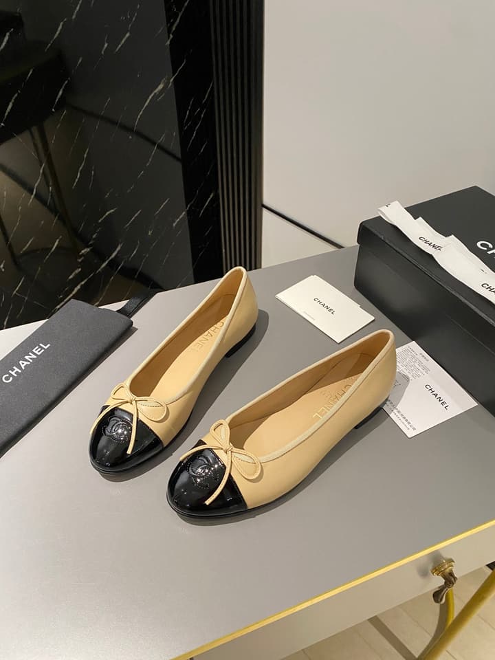 Chanel Classic Ballet Flats in Tan With Black Cap Toe