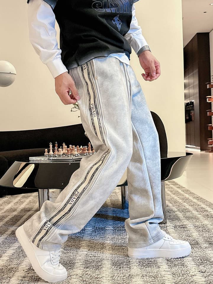 Prada Classic Logo Casual Pants – 2025FW in Black With White Side Stripe