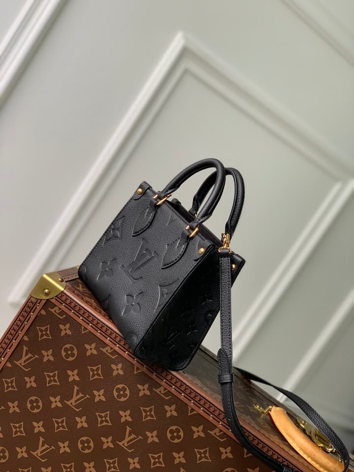 Louis Vuitton OnTheGo BB Monogram Empreinte Handbag in Beige And Cream Monogram