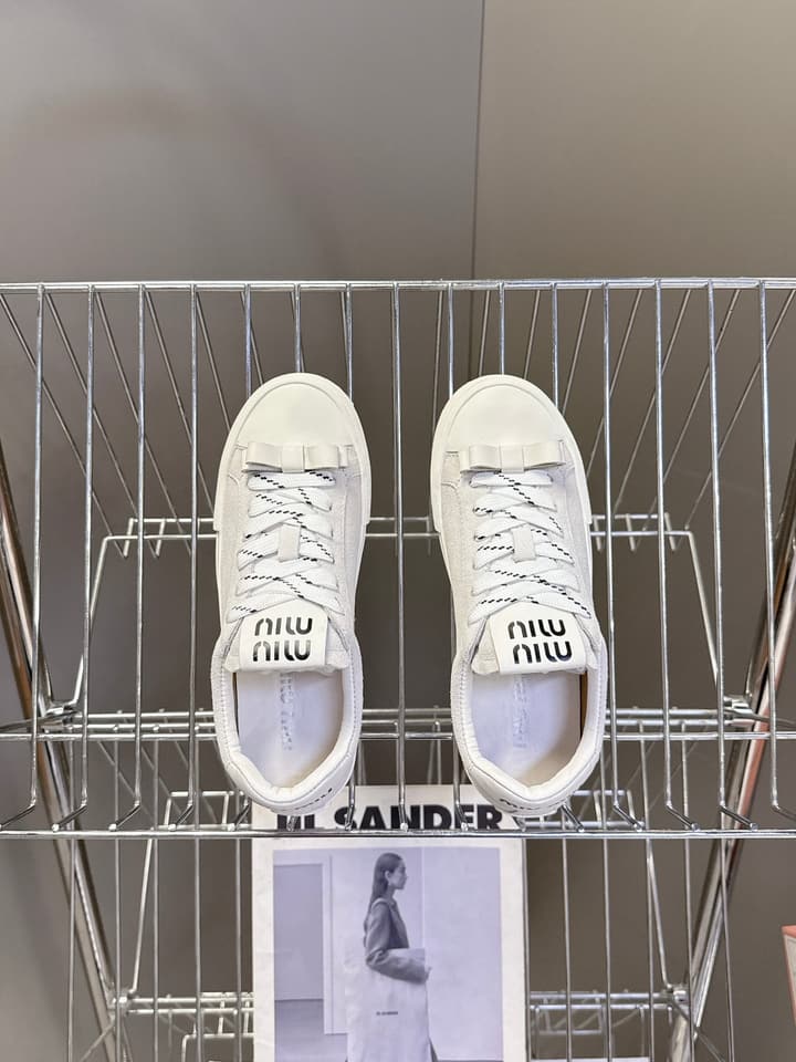 Miu Miu Distressed Retro Double Lace Sneakers in Red