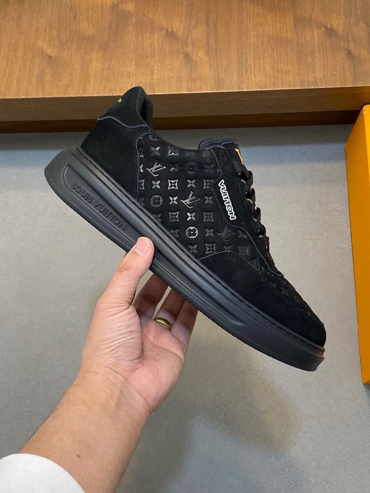 Louis Vuitton Embossed Calfskin Sneakers in Black