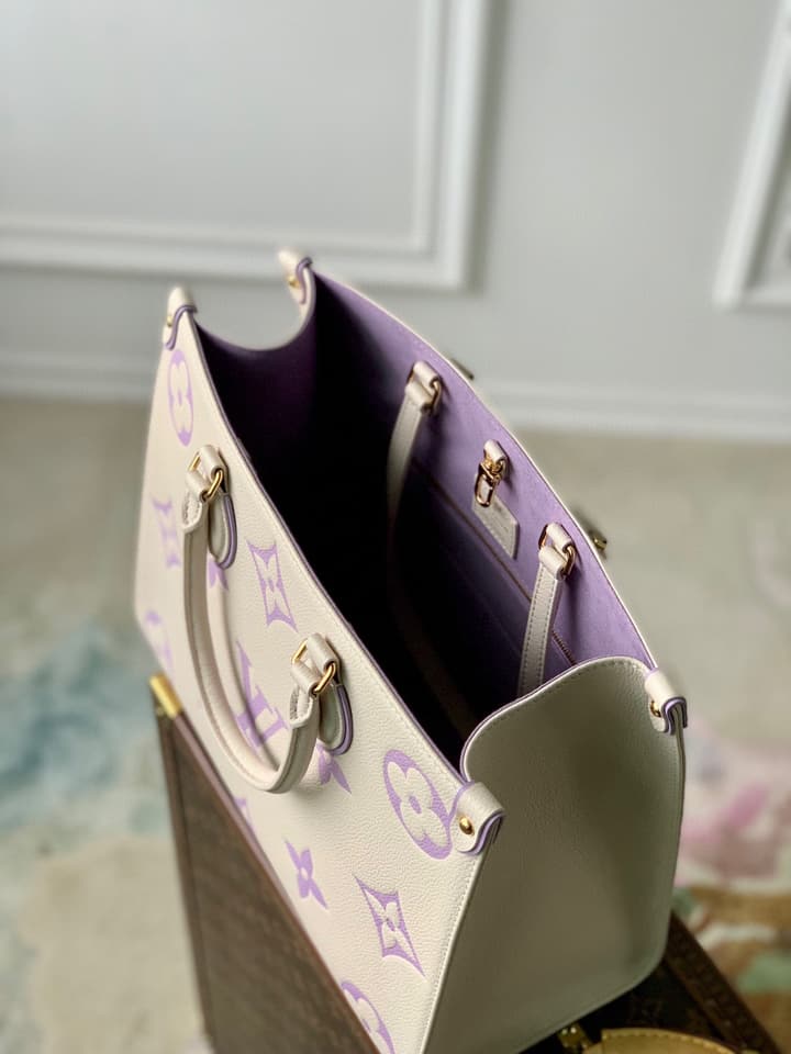 Louis Vuitton ONTHEGO Medium Tote Bag in Cream/white Monogram With Lilac Print