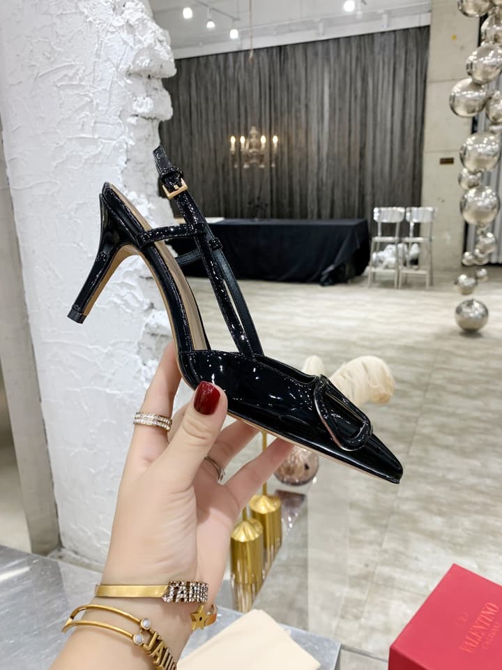 Valentino VLogo Pointed-Toe Patent Leather Pumps in Black Patent