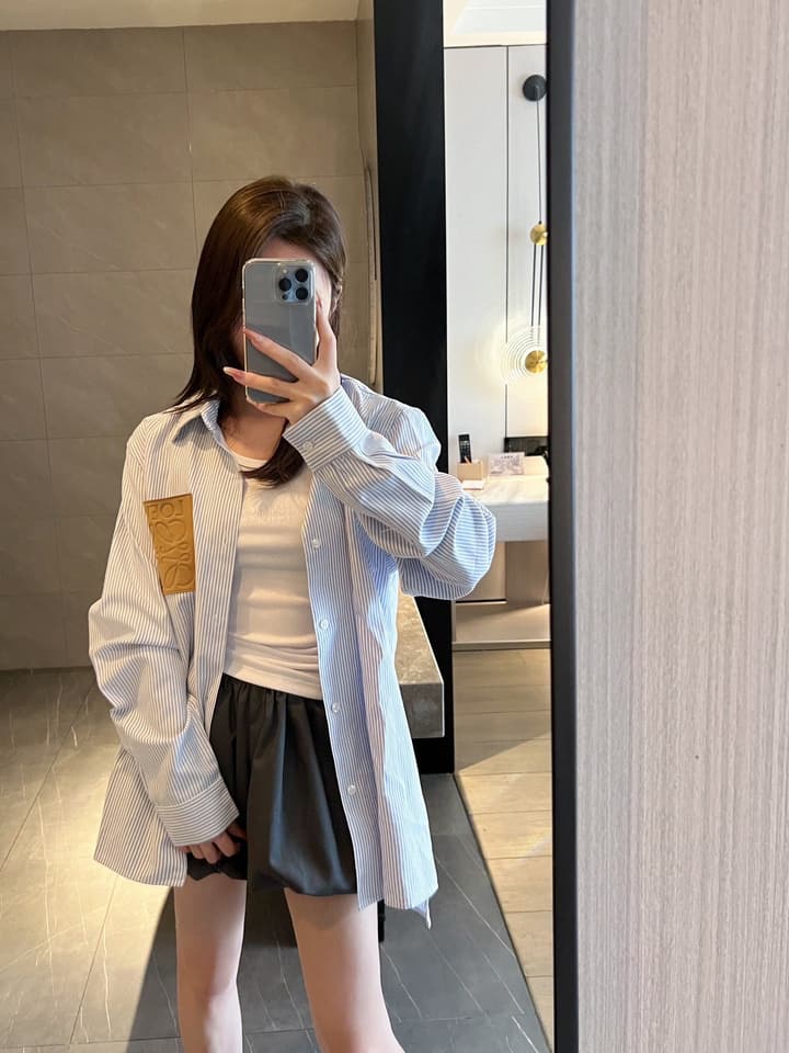 Loewe Embossed Logo Suede Pocket Striped Shirt in Tan Loewe Pouch, Light Blue Overshirt, Black Skirt - View 1