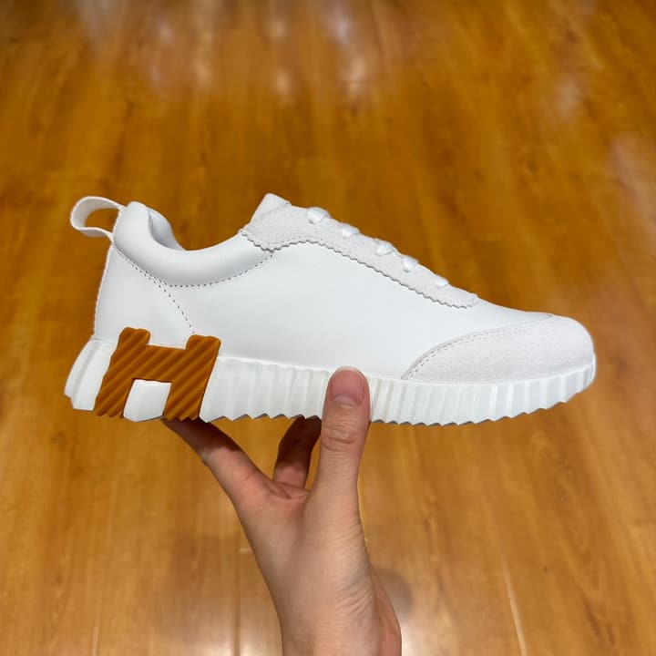 Hermès Bouncing Sneakers in Bright White With Orange H