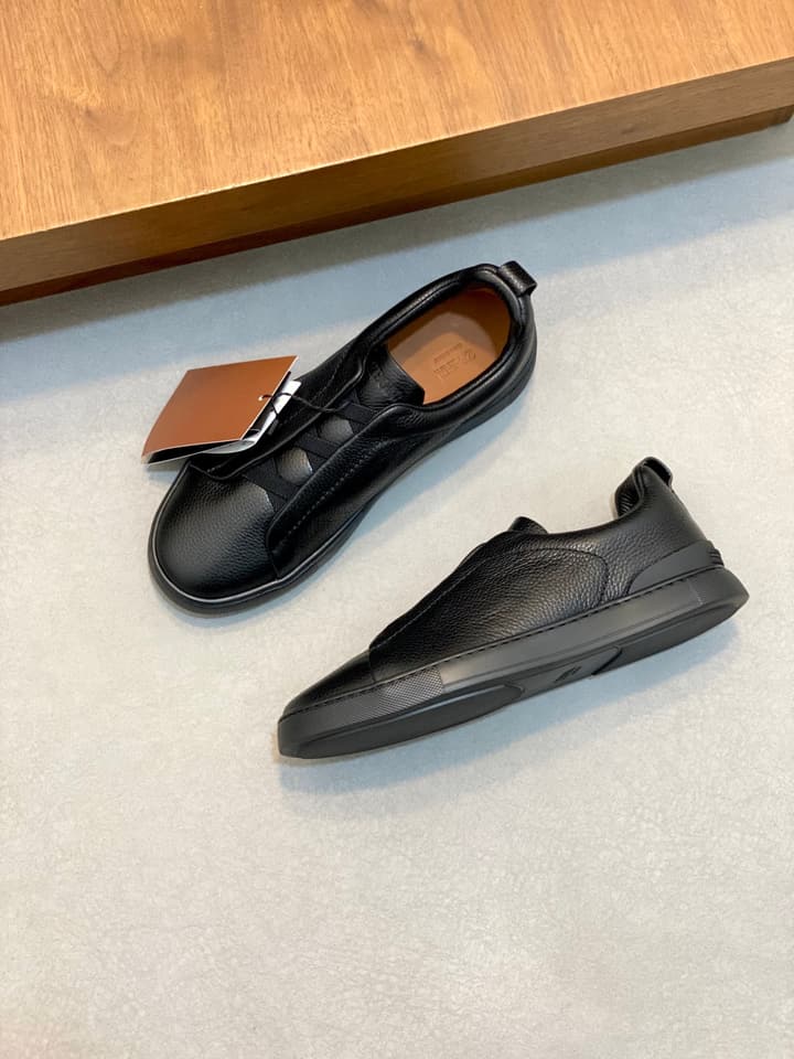 Ermenegildo Zegna Triple Stitch Sneakers in Black Leather With Brown Tag