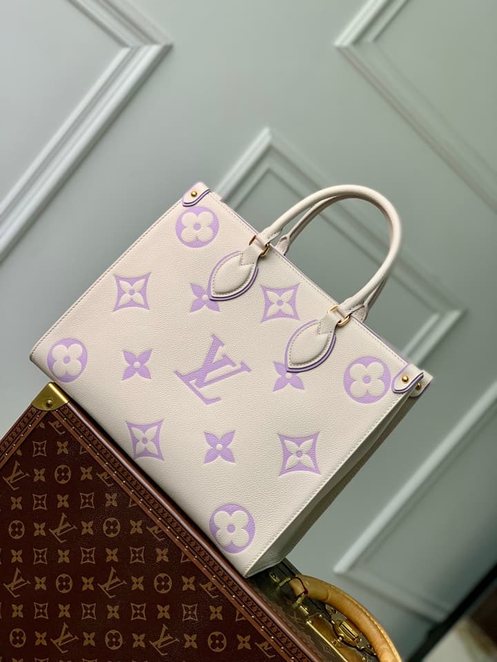 Louis Vuitton ONTHEGO Medium Tote Bag in Cream/white Monogram With Lilac Print