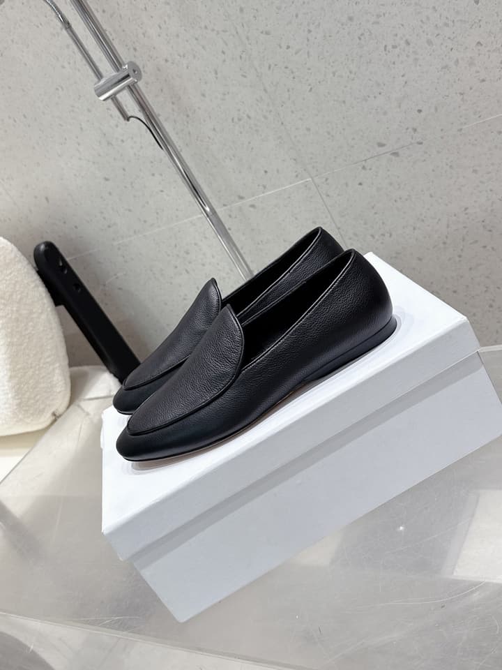 The Row Tassel Loafers in Black Suede